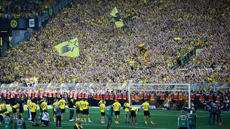 Explore the rich history of Borussia Dortmund History, from their early days to iconic players and legendary matches. Discover the club's triumphs 